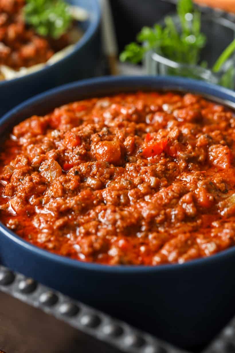 beef bolognese recipe in blue bowl
